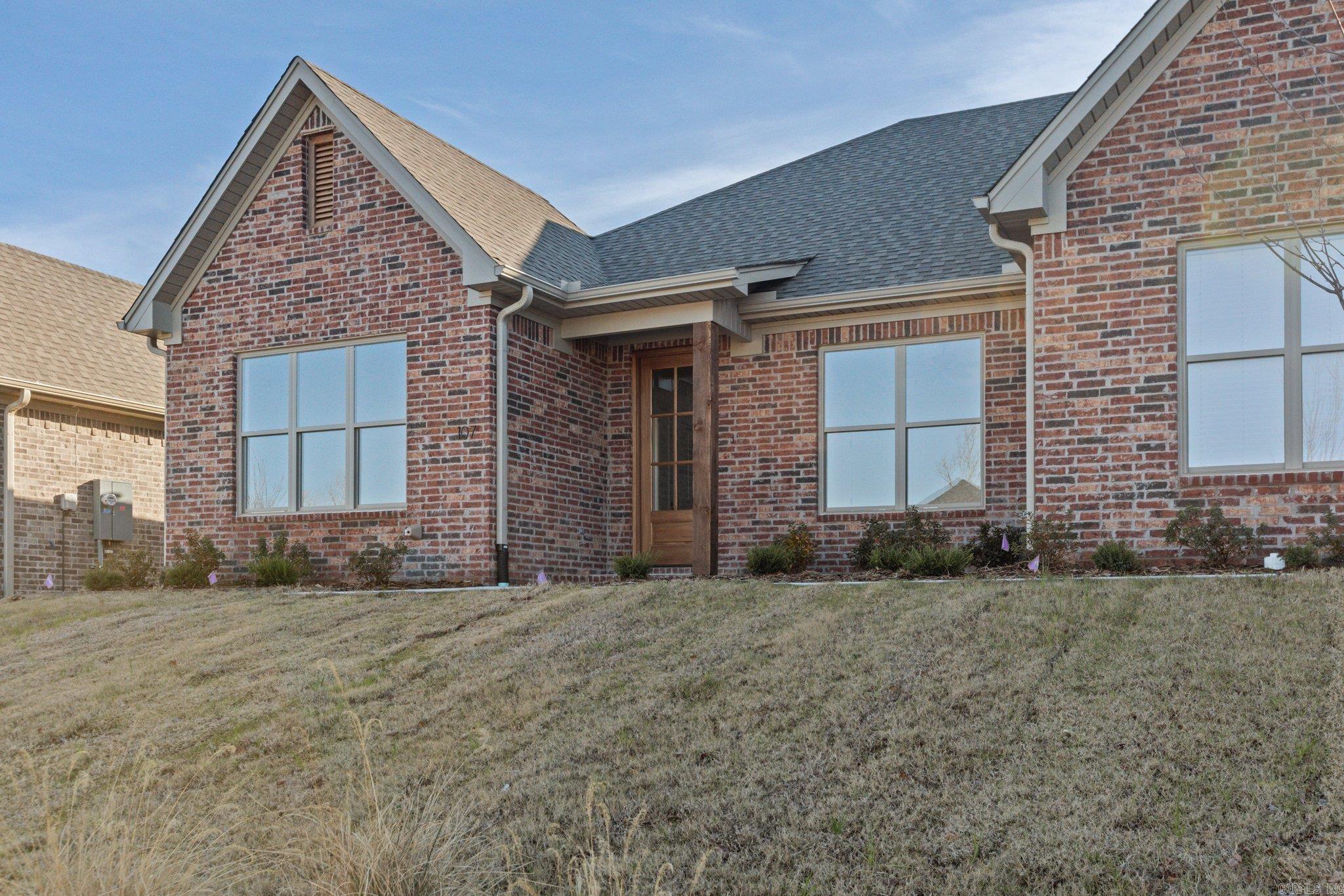 Welcome to Edgewood, West Little Rock's newest destination for luxury living! Nestled amidst lush landscaping and mature trees, this community offers a tranquil, secluded setting while keeping you just minutes from top shopping and dining destinations. One of the best perks? You'll never have to mow your lawn again! Lawn maintenance is included in your annual fees. This stunning Graham Smith built attached patio home boasts an open-concept layout with designer finishes throughout. It features a private owner's suite with a spa-like bathroom, a guest bedroom, and a versatile bonus room perfect for a home office, playroom, or anything you envision. The chefās kitchen, complete with a large center island, seamlessly flows into the spacious living area, which includes a beautiful electric fireplace. Each home is separated by fire walls with soundproofing to ensure a peaceful, quiet environment. And for the ultimate in comfort and relaxation, the back porch is an absolute must-see. As an end unit, it offers additional privacy, making it the perfect place to call home!