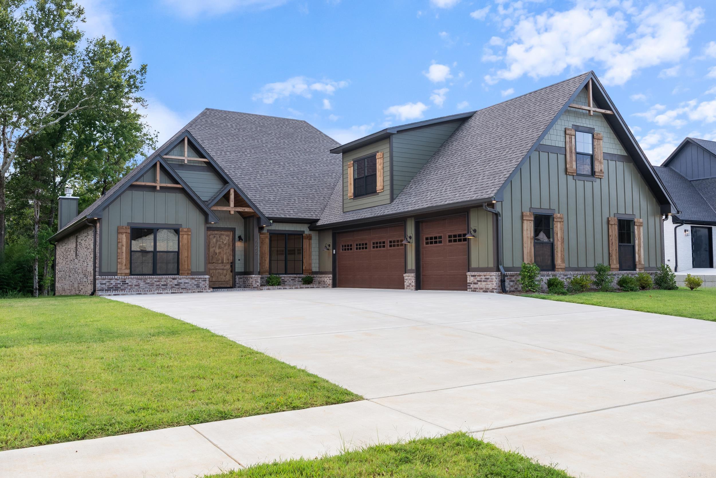 Stunning 4 bed/3.5 bath home with office and bonus room in Conway’s desirable Lands End subdivision! The main level features an inviting open floor plan with a spacious foyer that flows into a large living area, complete with luxury vinyl flooring, gorgeous lighting and a wonderful fireplace. The chef’s kitchen showcases a generous center island, white cabinetry w/champagne bronze hardware, wood accents, gas range with pot filler & a walk-in pantry. A dedicated office/flex space and a bright dining area make the layout both functional and versatile. The primary suite offers a spa-like retreat with a custom-tiled shower, soaking tub, dual vanity & a walk-in closet with abundant storage. Upstairs, a private fourth bedroom, full bath & large bonus room provide an ideal space for guests and entertaining. Enjoy outdoor living on the covered patio with wood-inlaid ceiling, ceiling fans& fireplace overlooking a beautiful green space. A spacious three-car garage and additional landscaping completes this thoughtfully designed home.