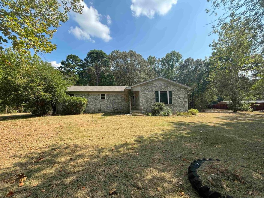 Brick home on 2 acres with 40x28 concrete block shop*shop and house both had new roofs in 2020*beautiful yard*17x14 enclosed back porch*large sunken den with vaulted ceiling*large kitchen*all appliances stay*clear termite inspection*this home needs lots of updates but priced accordingly at only $91 a square foot*selling as is*survey available under MLS docs*no property disclosure-executrix has never lived in the home*home has a Redfield mailing address but is in Grant County and the Sheridan Schools*easy to show!