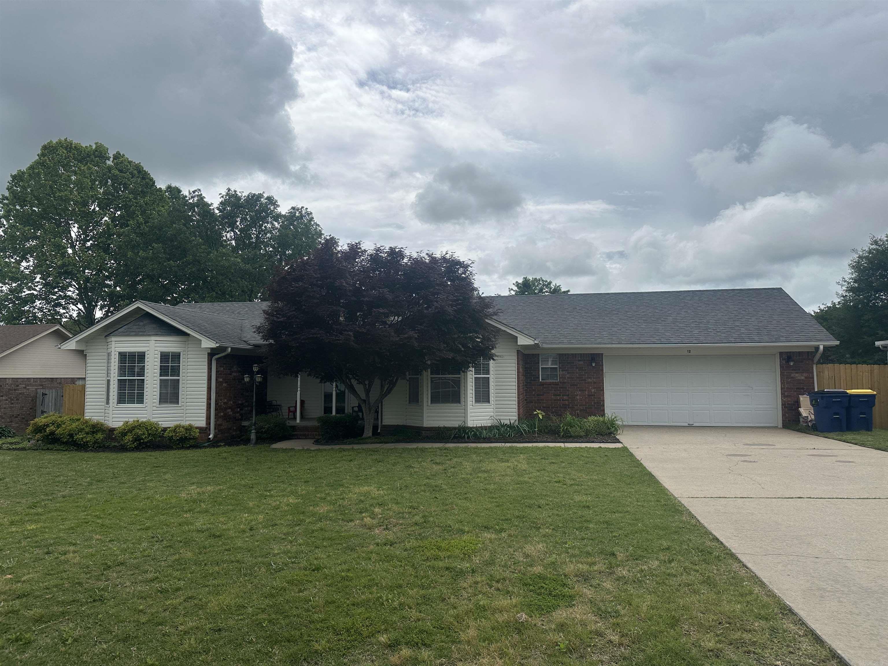 Oh WOW! This home has just been remodeled and SO IMPRESSIVE ! Kitchen flows into the living area with a neat breakfast bar-perfect for the little ones to eat their cheerios! Refrigerator is built into the wall and will remain with the home. So much countertop space with granite & subway tile! The cook in the family will LOVE this! The whole home has new paint (walls and trim) with such soft colors and new luxury vinyl flooring throughout. Both bathrooms updated with full walk in shower in primary bath-sweet! You will totally be impressed! Roof replaced in 2016 and brand new HVAC system in 2023. Yard in completely fenced also. Covered back porch for family BBQs! Backyard play set is negotiable. And...walking distance to elementary school! No bus/car lines needed!!! Disclosure and improvement list on docs online.