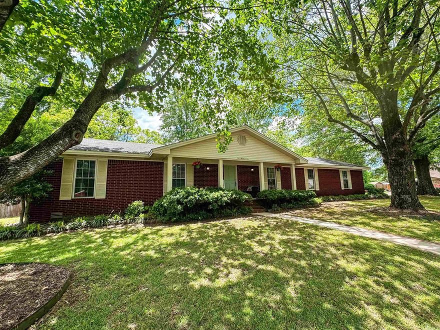 Sitting on a large over-sized corner lot in an established quiet neighborhood, this beautiful home was completely updated in 2019 including granite counter tops, bathroom remodels, laminate floors, new fixtures etc. There are two living areas & two dining areas. The laundry room is to die for with storage galore and a long counter for folding. The 4th bedroom is off the kitchen and is big enough to be a 3rd living room if needed/home-school room/craft area or large office. The possibilities are endless. Kitchen features include a spacious bar/island, large pantry, updated cabinets, stainless steel fridge & more. The main areas of the home have a fresh coat of paint as well. There are so many extra storage features including a built-in sidebar & cabinets in the formal dining room, built-in cabinets down the hallway, built-ins in the laundry room, walk-in closet in primary bedroom, large linen closet in hall bath, & built-ins in the 4th bedroom. Outdoor features include a privacy fence, storage building, large shade trees & a lovely covered back porch with plenty of space for entertaining! Owners recently installed brand new hvac system as well!