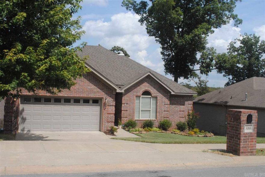 3/2 Split Floor Plan w/Open Concept, One Level, Foyer, HUGE Living Room w/Fireplace, Master Suite w/ His & Her Sinks, His & Her Closets, Jacuzzi Tub & Walk-in Shower, 2nd & 3rd Bedrooms w/Walk-in Closets!!! Dining, Kitchen w/Bar, Laundry Room, 2-car Garage w/Storage. Neutral Colors...Perfect for any Décor! Amazing Back Deck...just repainted!!! Tons of Storage under the Deck. Fully Fenced Backyard.  Saved the BEST for LAST...Lawn Service INCLUDED!!!