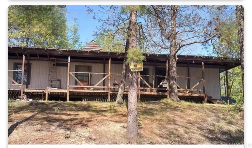 Property is close to downtown Hot Springs; ATV & horseback riding in the National Forest; fishing, camping, skiing/tubing on area lakes & private. Home needs work.