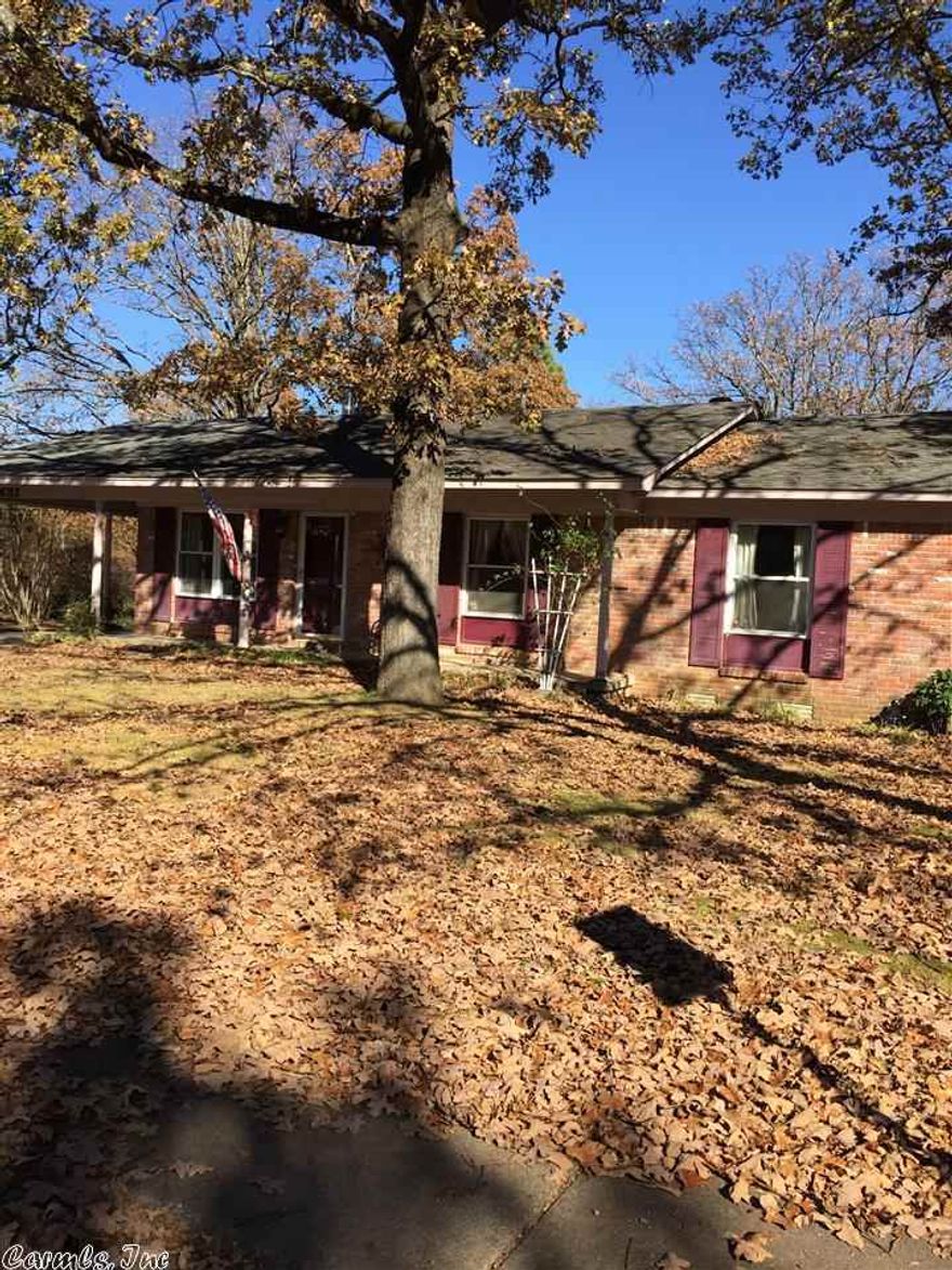 Cute one story brick and frame home with hardwood in living and bedrooms. Open floor plan, living room and a den. Square footage is an estimate.