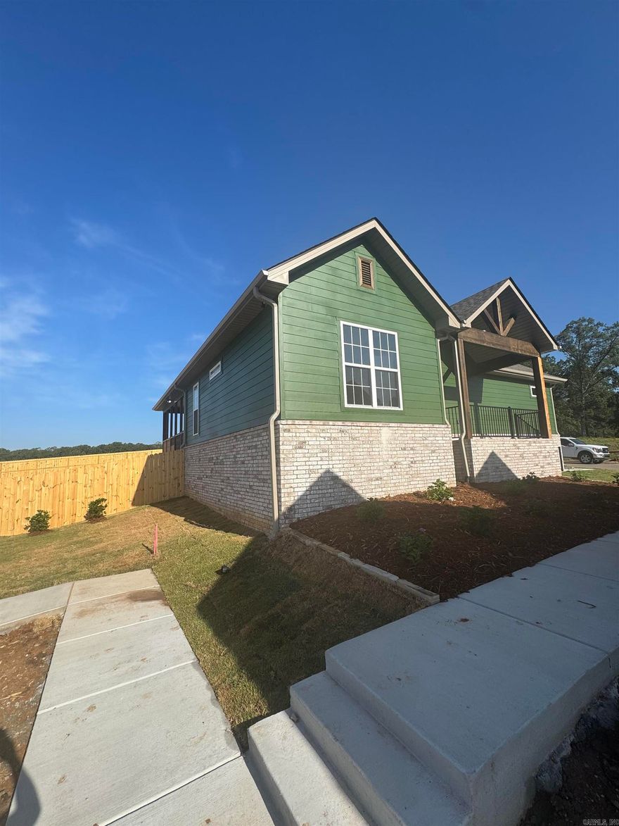 Discover this stunning Craftsman-style home nestled in Bryant's most desirable neighborhood! Boasting custom designer finishes throughout, this residence offers a blend of elegance and practicality. Its prime location provides the convenience of a short stroll to the neighborhood pool.  Imagine relaxing on the welcoming front porch and enjoying the nearby weekend farmers market. The home's thoughtfully designed layout features an open kitchen and living room, bathed in abundant natural light. Large Back Patio. Excitingly, there's still an opportunity to choose your interior selections!