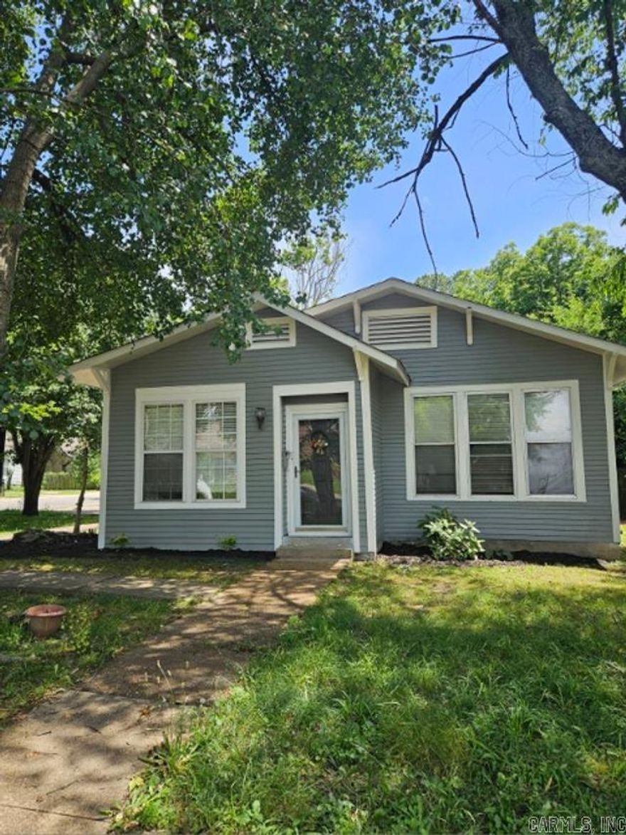 Located in the heart of Jonesboro this adorable cottage features 3 bedrooms, 2 bathrooms, fresh paint, new flooring, & a new roof. This home is on a great corner lot with wonderful curb appeal, a spacious, level, & fenced in yard. This won't last long, call today!