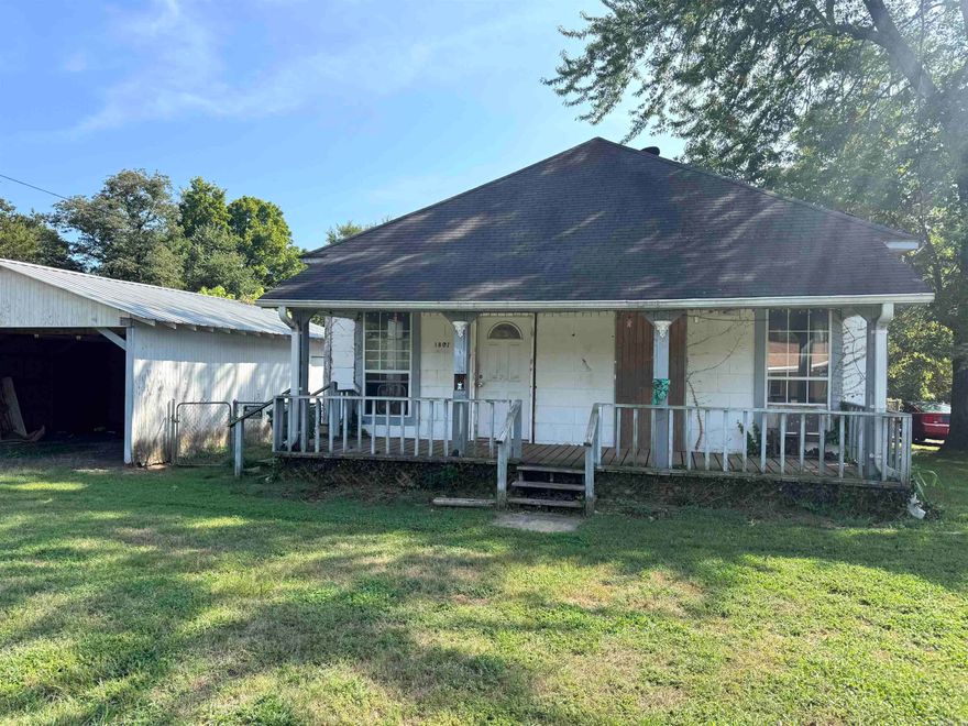 This 2-bedroom, 1 bath home offers great potential and is conveniently located close to schools, parks, and all the amenities of town. Built with character, the home features large wood-trimmed windows, original hardwood floors, a sunroom, and spacious layout ready for your updates. Sitting on a large lot, there is plenty of room for outdoor living, gardening, or possible expansion. With its timeless details, this property is the perfect project for an investor or buyer looking to bring new life into a home with charm. Being sold AS-IS, come see the possibilities today!