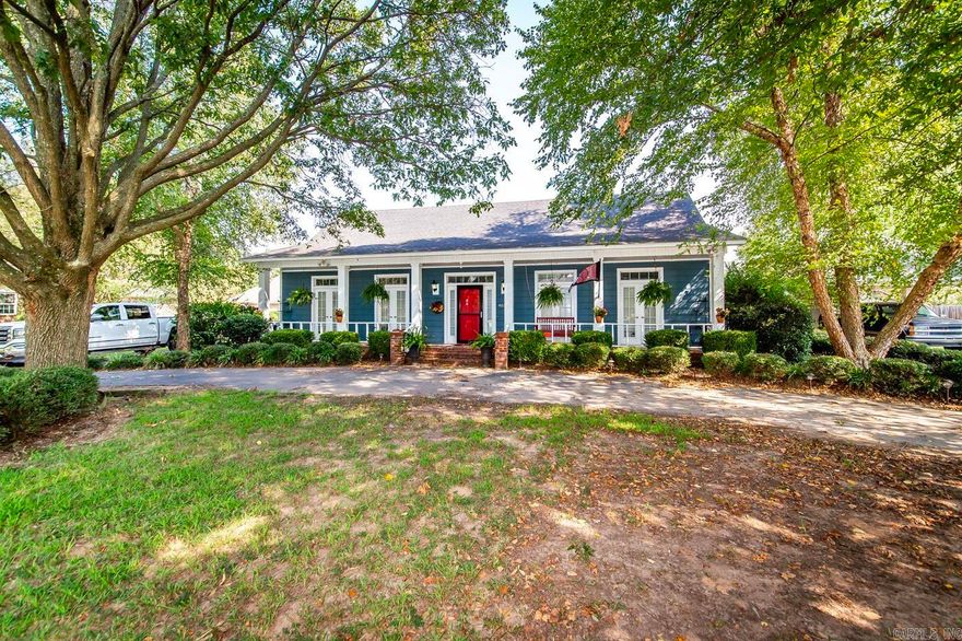 Want a Great House in a Great Neighborhood?  Check out this unique 3-bedroom, 2-bathroom, one story home, with workshop and storm shelter.   It offers hard surface flooring throughout with carpet in bedrooms, large walk-in closets, butcher block counter tops, 2 car and 1 car carports, screened in porch, separate patio and circle drive. Schedule a showing today! see agent remarks.