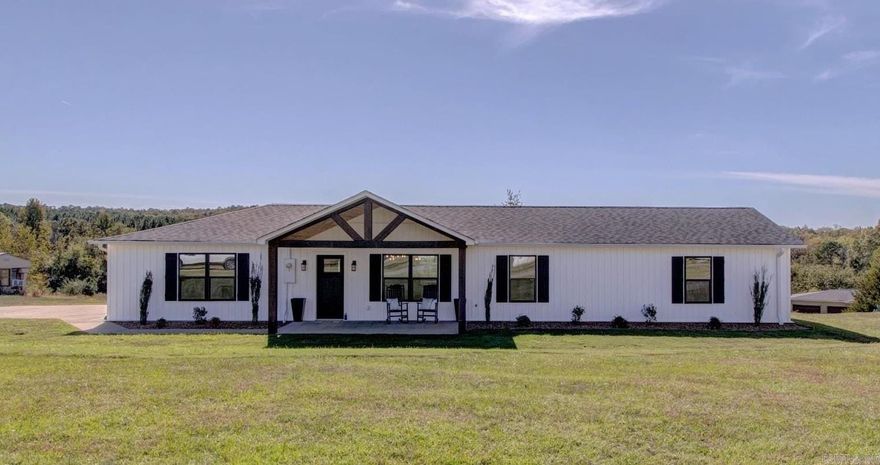 Fully Remodeled Lake Home ā Modern Style Meets Comfort! Every inch of this home has been completely transformed, blending timeless charm with upscale modern finishes. From the open-concept living spaces to the spa-like bathrooms.  Interior Features: All-new plumbing, electrical, recessed LED lighting, ceiling fans, & fixtures. Energy-efficient spray foam insulation, new sheetrock, doors, trim, & fresh paint. Luxury Vinyl Plank flooring throughout with tile in baths & laundry. Spacious open-concept living area highlighted by a shiplap fireplace. Dream Kitchen: Custom cabinetry w/ soft-close drawers & gold hardware Expansive quartz island w/ seating, farmhouse sink, & designer pendant lighting. Stainless steel appl, including stove, microwave vent hood, dishwasher & refrigerator. Stylish shiplap mudroom. Spacious bedrooms with walk-in closets. Guest bath with a custom vanity, LED light-up mirror, & statement tile floors Primary bath features a barn door entry, modern tile tub/shower with niches, and sleek Delta fixtures. New Covered patio, windows, roof, siding, and more. Min from Lacey's w/ a neighborhood boat launch. Call me today for a personal viewing!