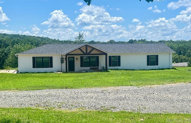 Complete remodel! Make an offer today & you can make w/ modern upgrades inside & out. Interior features all-new plumbing, electrical, recessed LED lighting, ceiling fans, & fixtures. Spray foam insulation, sheetrock, trim, doors, & fresh paint complement the Luxury Vinyl Plank throughout, w/ tile in wet areas. The stunning kitchen boasts custom cabinets, large island, quartz, farm-style sink, stainless steel appl, stove, microwave vent hood, dishwasher, & refrigerator. Open concept living area features shiplap electric fp w/ wood mantle. Spacious bedrooms w/ walk in closets. Guest bath features vanity w/ LED light-up mirror, both baths include tiled tub/shower combos w/ niches & Delta fixtures. New mudroom, pantry, doors, trim, sheetrock, paint, lighting, hardware New siding, soffits (with recessed lights), gutters, black architectural shingles/ windows/ shutters. Concrete back patio & a covered front porch w/ recessed lighting, cedar beams, & tongue & groove pine ceiling. Photos are of selections and finishes. Make an offer today & you can change a few selections to make this home your forever home. Completion will be mid May. Agents see remarks