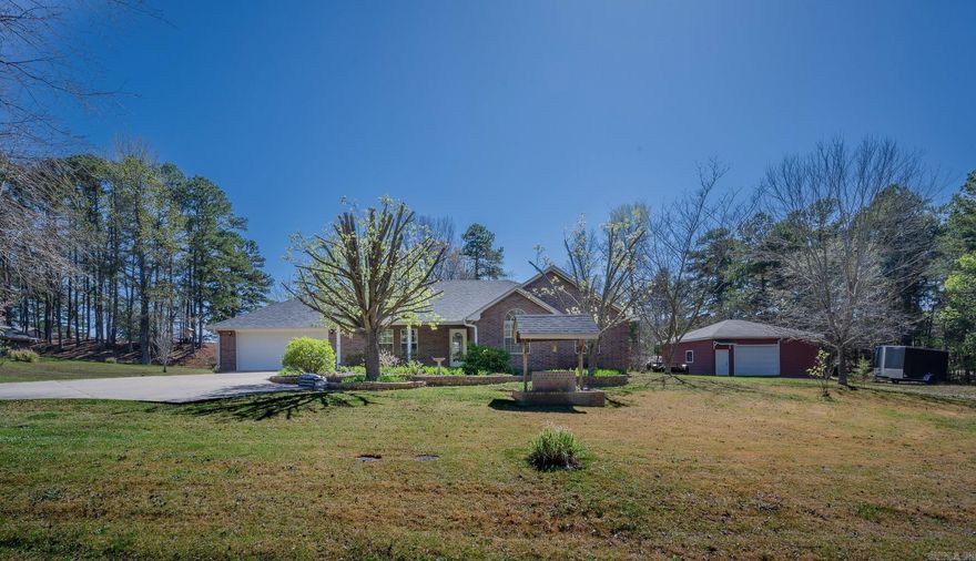 This is it! This beautiful 3-bed, 2.5-bath brick home sits on 1 acre on a quiet cul-de-sac, offering plenty of space to enjoy. Inside, the home features upgraded touches like the vaulted ceilings in the living room & one of the guest bedrooms, creating a bright & open feel. The spacious master suite includes a tray ceiling, large closet, & a relaxing bathroom w/ a jetted tub. All bedrooms offer generous closet space. The dining area features patio doors that open to the backyard patio & in-ground swimming pool—perfect for entertaining or relaxing during warm Arkansas summers. The pool area is surrounded by a privacy fence & includes a new pool cover installed last year. Additional highlights include a 2-car garage, a nice concrete driveway, & a 26x30 shop that provides excellent space for hobbies, storage, or extra vehicles. The front yard features extra landscaping that adds to the home’s curb appeal. A new roof was installed in 2024. All appliances stay, making this home truly move-in ready. Located just minutes from the beautiful Ouachita National Forest & nearby ATV or MT bike trails, this property is ideal for outdoor enthusiasts who want comfort at home & adventure close by.