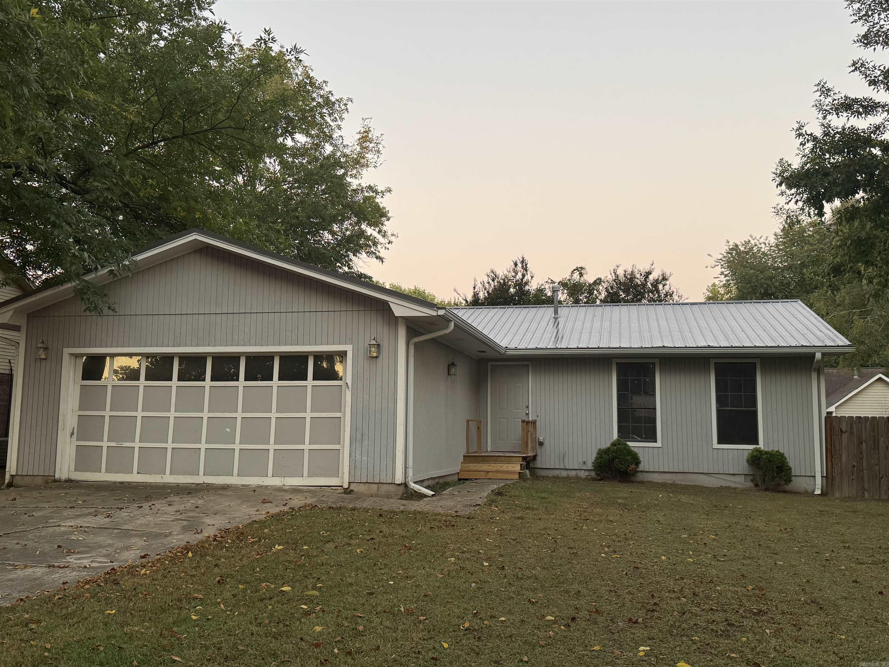 Welcome to this charming 3-bedroom, 2-bath home located in a quiet, established neighborhood in Searcy. This well-maintained property offers a comfortable layout with a spacious living area that flows into the dining space and kitchen, creating a warm and inviting atmosphere. The kitchen includes ample cabinetry, updated appliances, and convenient access to the backyard deckāperfect for entertaining or relaxing outdoors. The home features a mix of hardwood and vinyl flooring, a dedicated laundry room, and an attached two-car garage for added convenience. The metal roof adds durability and low maintenance appeal. Situated on a nicely sized lot, the backyard offers plenty of space for gardening or play. Located just minutes from schools, shopping, and dining, this home provides both comfort and convenience. Whether youāre a first-time buyer, downsizer, or investor, 15 Overlook Rd offers great value in a desirable Searcy location.