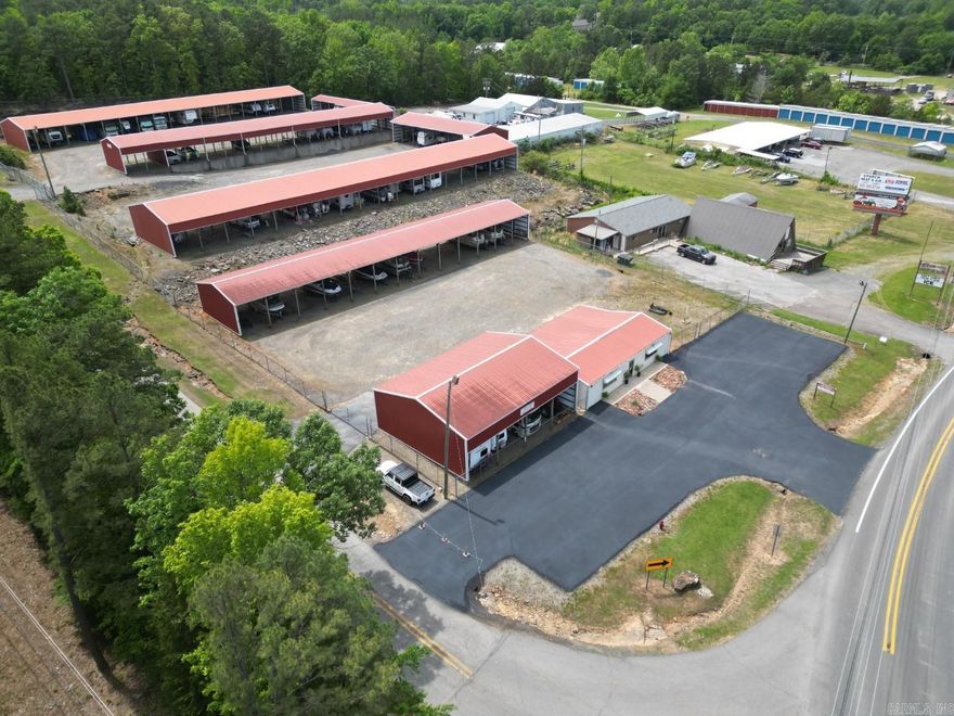 Excellent investment opportunity in Heber Springs. This 81-unit storage facility is ideal for boats, RVs, travel trailers, offering income potential. Conveniently located near Dam Site Marina and the Heber Springs Airport, this property is perfectly positioned for lake visitors, vacation homeowners, and outdoor enthusiasts. The property also includes an office building, providing space for management, rentals, or additional business operations. Easy access, great visibility, and close proximity to some of the area’s most popular boating and recreation destinations. Whether you’re looking to expand your investment portfolio or own a storage business near the lake, this property offers endless potential.