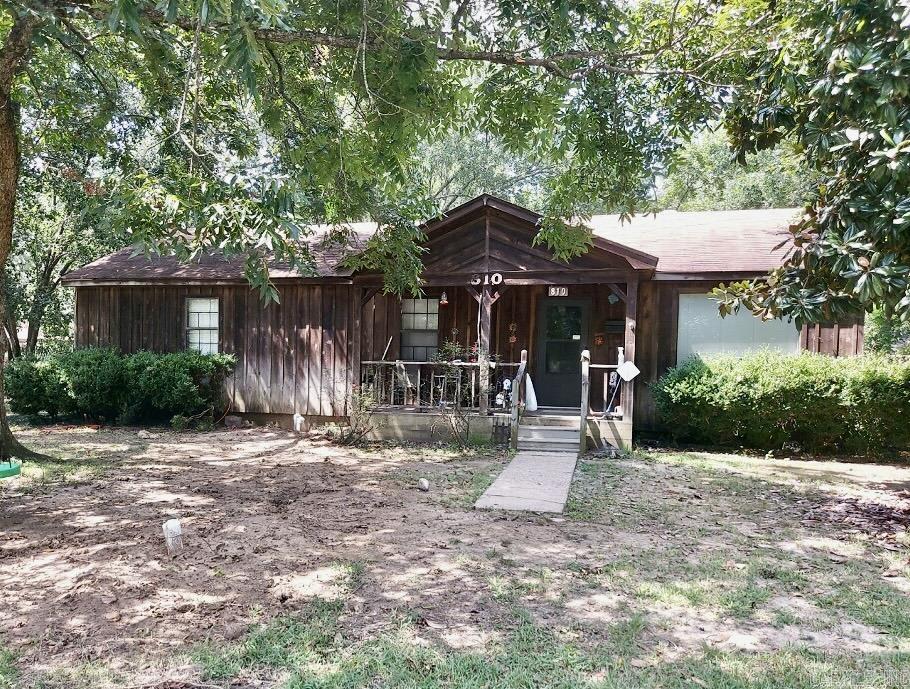 Cedar home on corner lot, 3 bed/2bath, fenced in back yard.