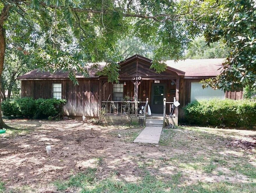 Cedar home on corner lot, 3 bed/2bath, fenced in back yard.