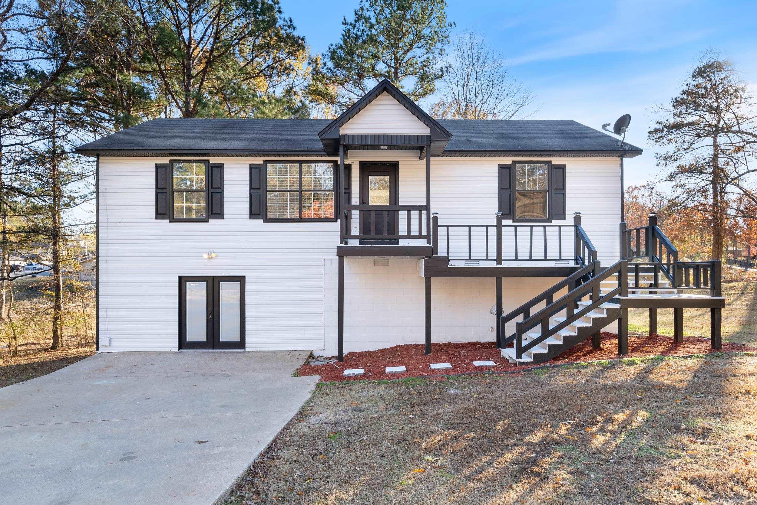 *See video tour below!* Completely remodeled 1,850 sq. ft. home with 4 bedrooms and 3 bathrooms, offering modern updates throughout. This property includes an additional city lot, providing extra space for expansion or the option to sell to an investor. The home features a 600 sq. ft. unfinished basement with dual access (interior and exterior), offering endless possibilities—use it for storage, a workshop, a studio, or convert it into additional living space. The ground level boasts over 500 sq. ft. of versatile open space, perfect for a gym, home theater, game room, or even a master suite. This floor also includes a full bath, direct access to the unfinished basement, and a door leading to the backyard. Upstairs, you'll find 3 spacious bedrooms and 2 full baths, with a private balcony overlooking the backyard. Every corner of this home has been thoughtfully updated with a fresh, modern design. At just $120 per sq. ft., this is an incredible value for a fully renovated home with so much potential.