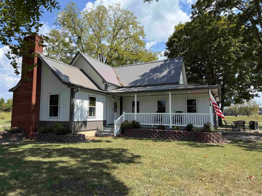 A completely remodeled older farmhouse in historic Mountain View, Arkansas, sits on 1.18 acres and offers the perfect blend of charm and modern comfort. The home features three spacious bedrooms with large closets, two beautifully updated bathrooms with walk-in showers, and a fully finished open-concept living area with a newly installed electric fireplace. The kitchen, bathrooms, and laundry room are highlighted with elegant granite countertops and new cabinetry, providing both style and function. The exterior has been refreshed with new siding, fresh paint, landscaping, and a durable metal roof installed in 2023. A new HVAC system was also added the same year for worry-free living. Outside, a 36 x 23 fully wired shop with a half bathroom offers exceptional space for projects or hobbies, while the detached two-car garage adds additional parking and storage. A storm shelter provides peace of mind during Arkansas weather. This unit has functioned as an Airbnb/VRBO the last year and a half, grossing over $30,000. Furniture is negotiable with the sale.