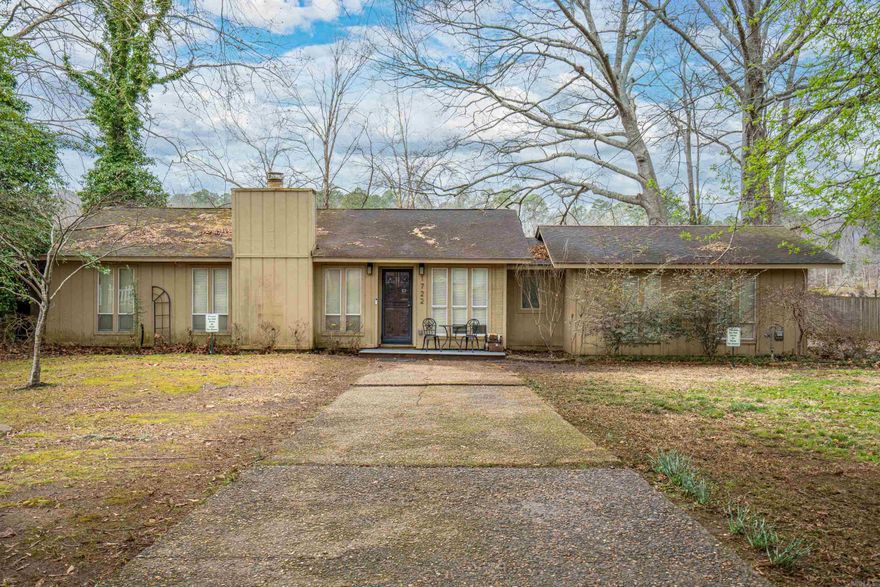 This affordable lakefront home on Lake Hamilton features three spacious bedrooms and two modern bathrooms, ideal for families or guests. The open-concept living area is accentuated by elegant granite countertops in the kitchen, providing a stylish space for cooking and entertaining. Through the kitchen is the sought after Arkansas Room for year round panoramic lake views as you step outside to enjoy the inviting outdoor seating area. The fenced yard ensures privacy and safety for pets and children, while the sea wall adds a touch of sophistication and peace of mind against erosion. The property also includes a two-car garage, providing ample space for vehicles and storage. . FULLY FURNISHED and ready to move in, this home is a true gem on Lake Hamilton, offering both luxury and convenience for a lakeside lifestyle. As an active STR, the next owner can enjoy income property or maintain a warm lakeside retreat for themselves.