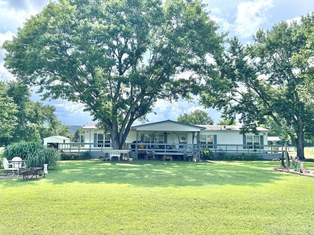 Its country living meets convenience, just a stoneās throw from town! Nestled on 5.63 level acres, centrally located between Bull Shoals Lake, White River, and the Buffalo River - this would make the perfect place to start a mini farm, garden, or just simply enjoy the peaceful, end of the road setting with epic sunrise and sunset viewings from your porch. No restrictions against horses, subdividing, further developing, etc. Formerly farmed as blueberry fields, the usable pasture is plentiful, and the opportunities are vast! Call the listing office to schedule a viewing while it last.