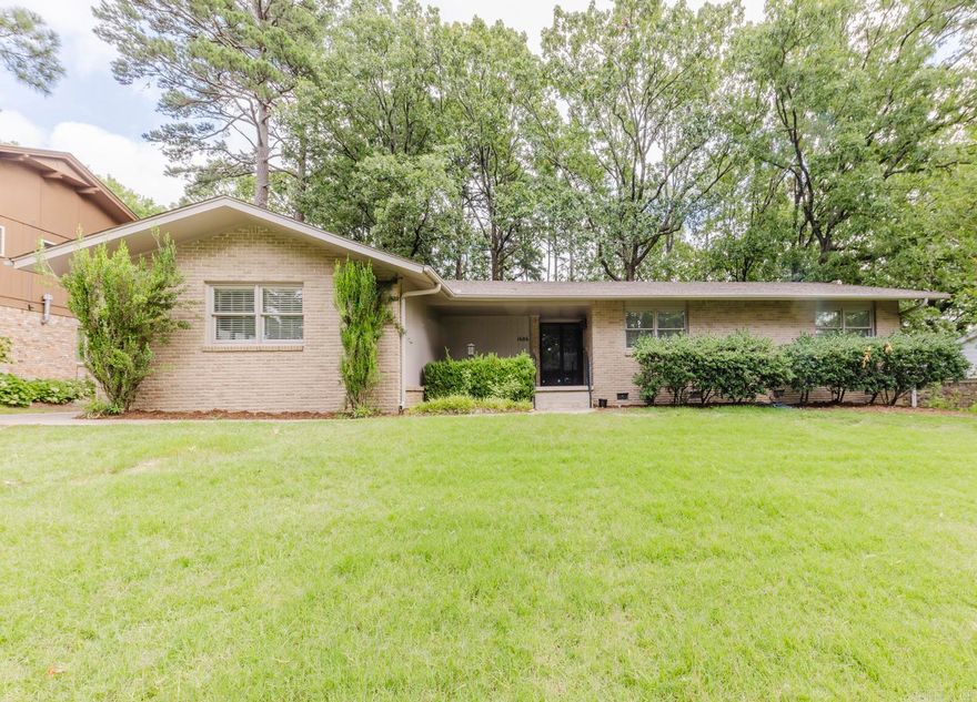 Discover your dream home in the heart of Leawood! This beautifully updated 3-bedroom, 2-bathroom residence sits on a generous .47-acre lot, offering ample space and modern amenities for comfortable living. The expansive den, featuring a cozy gas log fireplace (new gas logs 2023), is perfect for gatherings or quiet nights in. The home boasts a stunning kitchen equipped with quartz countertops, stainless steel appliances, a gas range, and convenient breakfast bar.  All bedrooms have brand new carpet (2024)!  Step outside to enjoy the expansive backyard, complete with a spacious patio ideal for outdoor entertaining, gardening, or simply relaxing in the sun.