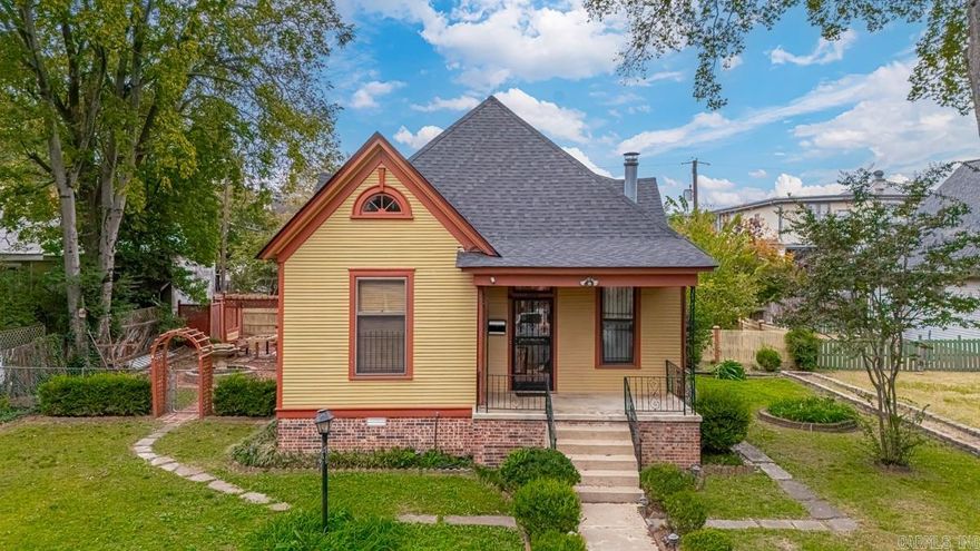 Charming 1904 Shotgun-Style home in the historic Quapaw Quarters! Step back in time with this beautifully preserved 1904 home nestled in the heart of Little Rock's coveted Quapaw Quarters, just two blocks from the vibrant SOMA district-a lively hub brimming with local restaurants, bars, boutique shopping, and entertainment. This charming shotgun-style residence perfectly captures the character and craftsmanship of its era while offering the warmth and comfort of home.  Inside, you'll find two spacious bedrooms on the main level, one full bathroom, and a bonus room upstairs that could easily serve as a third bedroom, office, or creative studio. True to its period style, the home features tall ceilings, original detail, and a layout that blends cozy living with timeless charm. The inviting front porch welcomes you to sit and take in the neighorhood's historic beauty surrounding you. There is ample parking off street and inside the shop/ garage behind the home. Greenhouse in back yard. Homes like this rarely come available-don't miss your opportunity to own a piece of Little Rock history with modern convenience just steps away! Schedule your showing today! **AGENTS SEE REMARKS**