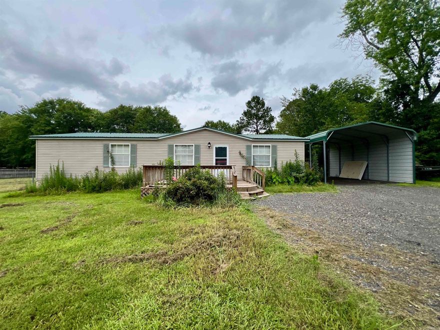 Welcome home to the perfect first home in the Cabot School District. Double wide modular home on a permanent foundation fully fenced covered parking additional outdoor storage. Super Clean well maintained and move in ready won't long at this amazing value. Bonus value two lots two addresses and utilities for both in town could be great opportunity for expansion of home business work shop or additional dwelling.  Tenant pays all utilites