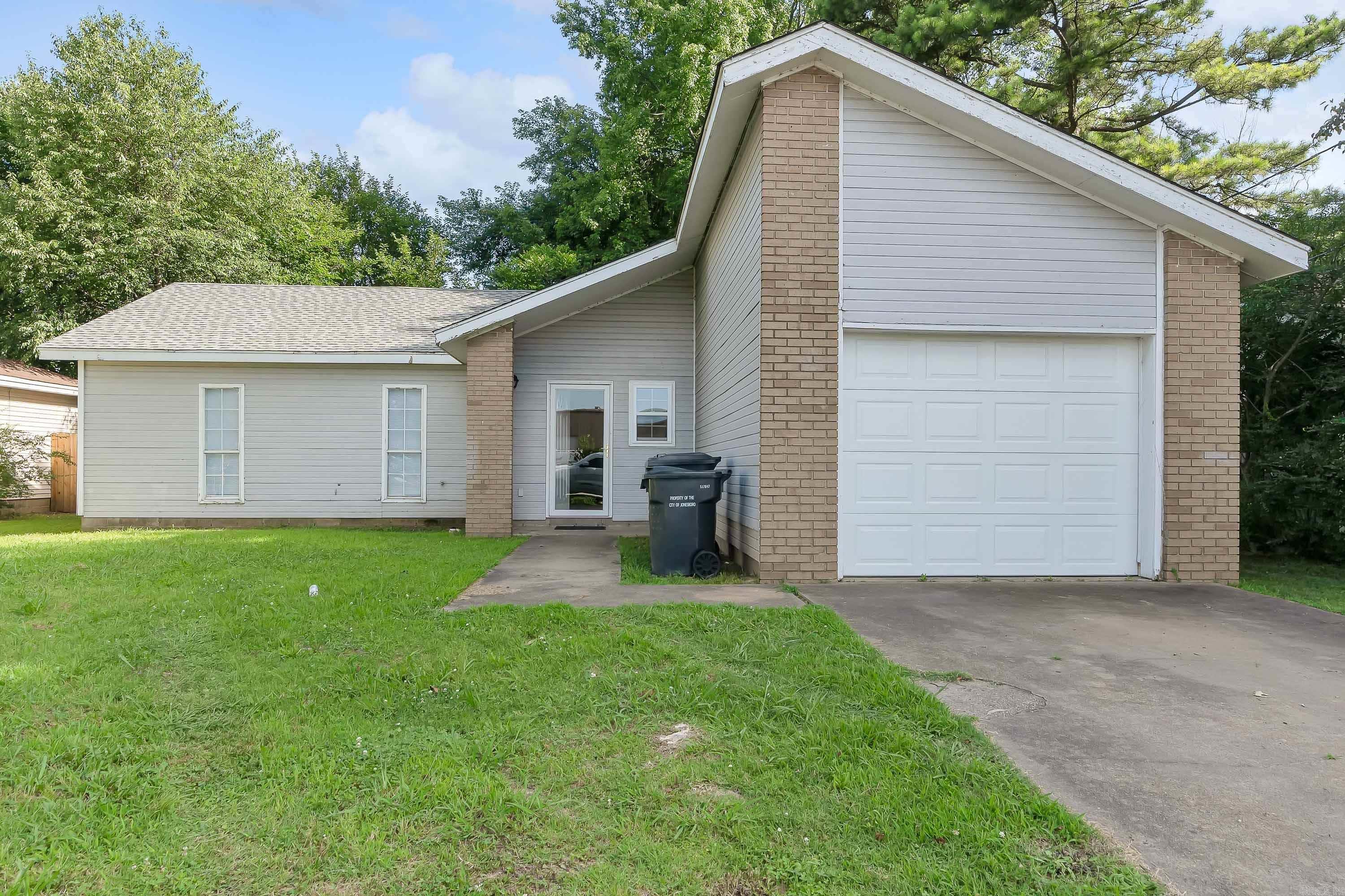 Discover the potential in this 3-bedroom, 1.5-bath home in a prime location within the Jonesboro School District. Ideal for investors or DIY enthusiasts, this property requires some TLC to truly shine. Enjoy the comfort of a new roof & newer HVAC unit and the convenience of a 1-car garage. The privacy-fenced backyard features a cozy patio, perfect for outdoor relaxation or entertaining. With a little vision and effort, this home could be a standout investment. Don't miss this opportunity to create a dream space in a sought-after neighborhood.
