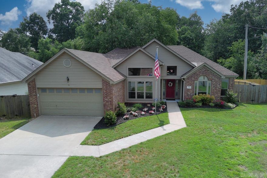 Experience the charm of this immaculate home in Little Rock's most desirable neighborhood. Located on a quiet street, it combines tranquility with the convenience of nearby amenities. The generous living room and large kitchen featuring new flooring and windows, form the heart of this home. The unique split floorplan ensures privacy, while the cool primary bedroom suite offers a personal retreat with an added sitting area. Outside, a private backyard with a charming tree swing awaits. This extremely clean, move-in ready home is a rare opportunity. Call a Realtor now to see it!