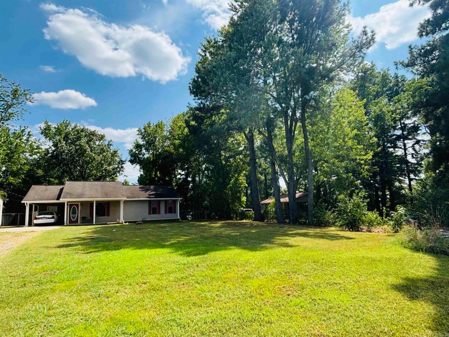 Location! Location! Location! Beautiful 2-bedroom home in Southside! This well-maintained home sits on a quiet road in a beautiful setting with almost half an acre, a large front yard, private chain-link fenced backyard perfect for an outdoor living area and a safe place for your children or fur babies to enjoy outdoor space, plus a nice outdoor storage building! The property's perimeter is beautifully lined with large trees providing both shade and privacy and has a concrete driveway leading all the way to the backyard shed. The spacious home offers over 1400 sq ft, is move-in-ready, with nice updates including HVAC, guttering, and flooring. You're sure to love the vaulted ceiling in the living room, the spacious floor plan with a kitchen/dining combo, oak cabinets, walk-in closet, large laundry room, and inviting family room/den. Whether enjoying morning coffee while relaxing on the front porch, or quiet evenings in the peaceful backyard, this home is perfect for couples, families, and retirees alike all at an incredible price and ideal location! Call today for more information or to set up a viewing. (Addtl shed next to carport does not convey w/sale)