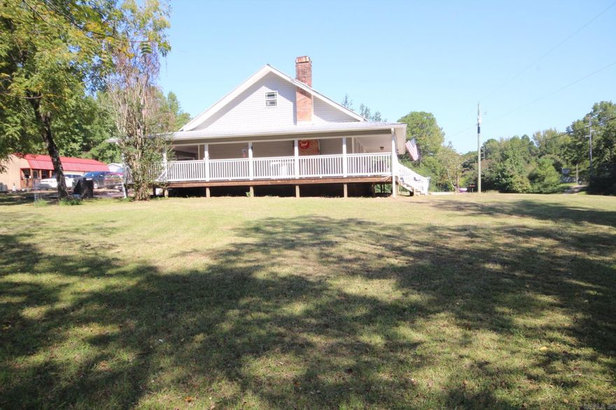 JUST A SHORT DISTANCE TO CRATER OF DIAMONDS STATE PARK, LAKE GREESON AND LITTLE MISSOURI RIVER. 3 bedrooms, 2.5 baths with approx. 2512 Sq. Ft. of livings space.  Kitchen is spacious with lots of cabinets, concrete counter top and a wood epoxy Island. Large living area, and a large upstairs bonus room.   Home features a covered wrap-around porch.  Central A/C & Heat.  Metal Roof. Range, refrigerator and washer/dryer conveys with sell of home. Property has a storm shelter, two outbuildings and pond.