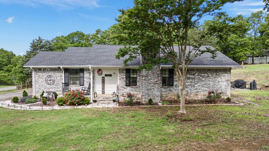 Located on over an acre corner lot, this beautiful 3 bedroom, 2 bathroom home offers a serene escape from the hustle and bustle of everyday life. The open floor plan and cozy fireplace in the living area create a warm and inviting atmosphere, perfect for gathering with family and friends. The split floor plan provides privacy and separation between the master suite and the additional bedrooms, offering a peaceful retreat for the homeowner. The spacious master closet provides ample storage space, ensuring that organization is never an issue. The expansive outdoor space allows for endless possibilities, whether it be gardening, outdoor entertaining, or simply enjoying the tranquility of nature. This property truly offers the best of both worlds - the convenience of modern amenities