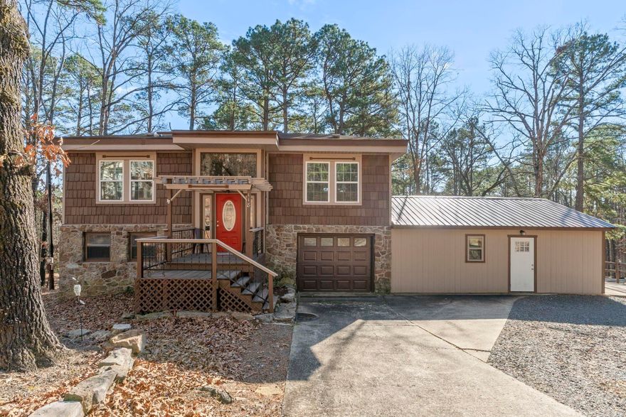 Extensively renovated (since 2021) with high-end upgrades throughout, including Lennox HVAC, DaVinci shaker siding shingles, beautiful Wisconsin pine wood floors, new windows, doors , fresh paint, new sheetrock, and updated fixtures throughout. The kitchen features custom countertops and stainless appliances, the master bedroom has expanded what was 2 bedrooms into 1 but you could easily have the wall reinstalled to have an extra bedroom, Updated bathrooms, including one with dual shower heads. Major upgrades include a Rheem water heater, owned propane tank, propane backup heater, and new grinder pump. Enjoy three newly stained decks with vista views of Greers Ferry Lake and the Ozark Mountain ridgelines. Exterior improvements include new landscaping, grass, driveway, and a new 2-car garage with metal roofing and new garage door. Located just blocks from the Greers Ferry Lake marina, this home delivers exceptional quality, views, and location & having access to docks, pool, hiking trl,golf course makes this home one-of-a-kind. possible to lease before purchase  sq ft approx measuring encouraged see agent remarks see mls 26000804