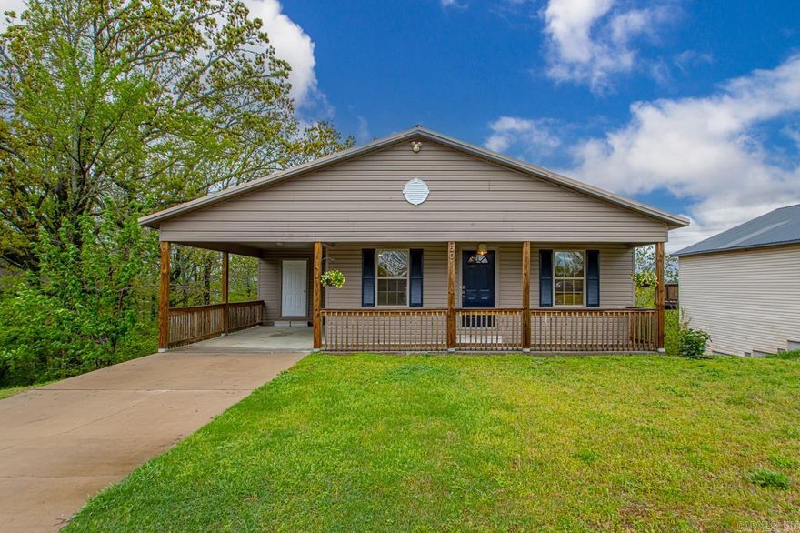 Ready to be called home! This 3 bedroom 2 full bath house has brand new carpet and fresh paint! Plenty of storage: pantry in kitchen, storage room off carport, and big potential under the house. Imagine what you could do with a walk-in space nearly the length the house? Home is situated on .47 acre with a level front yard and sloping green space in back yard that creates privacy. Enjoy sitting on the back deck, listening to the birds, and seeing the views. Great layout with spacious bathrooms! Lots of counter space. Metal roof! One owner!