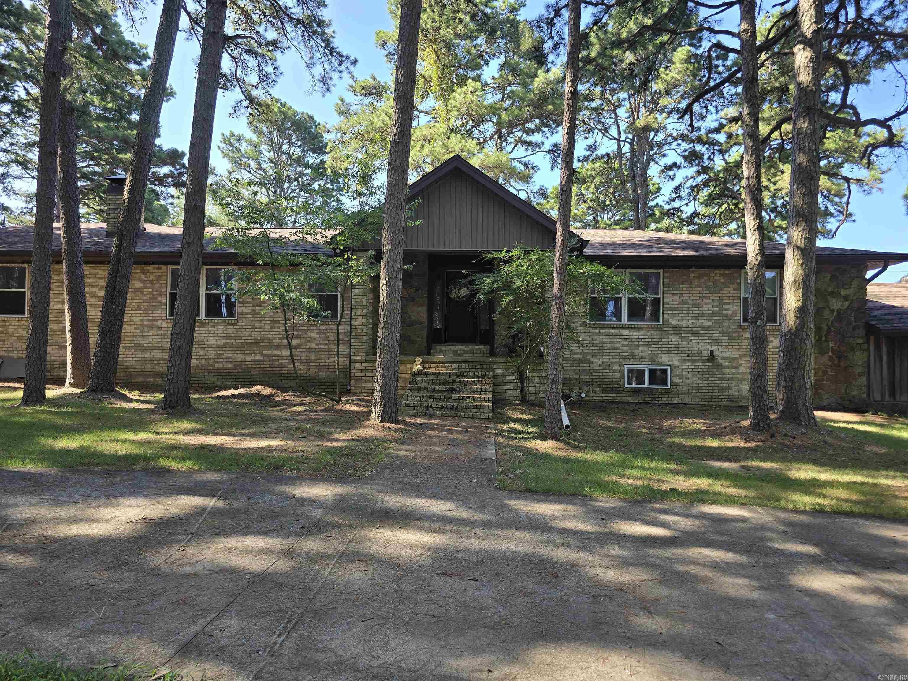 This beautiful 11.57-acre property is fully fenced with a 59'x93' barn, a 40x40 pole shed and 10x22 pole shed. This amazing property also features a 4088 sq ft split level home with 1728 sq ft of basement space! This home is full of opportunities with so many multi-purpose areas, the possibilities are endless. The home has 3 kitchen areas, two living areas, office space, dinning space and plenty of room for a game room, media room or anything else you may need or want. There are currently 4 bedrooms, 3 full baths, and 2 half baths. Carports are located on both ends of the home and a single car garage on one end. You can entertain on the spacious covered back porch or in the 312 sq ft sunroom or just relax in front of the fireplace. There are too many wonderful features to mention so come see this rare find today! Additional acreage available!