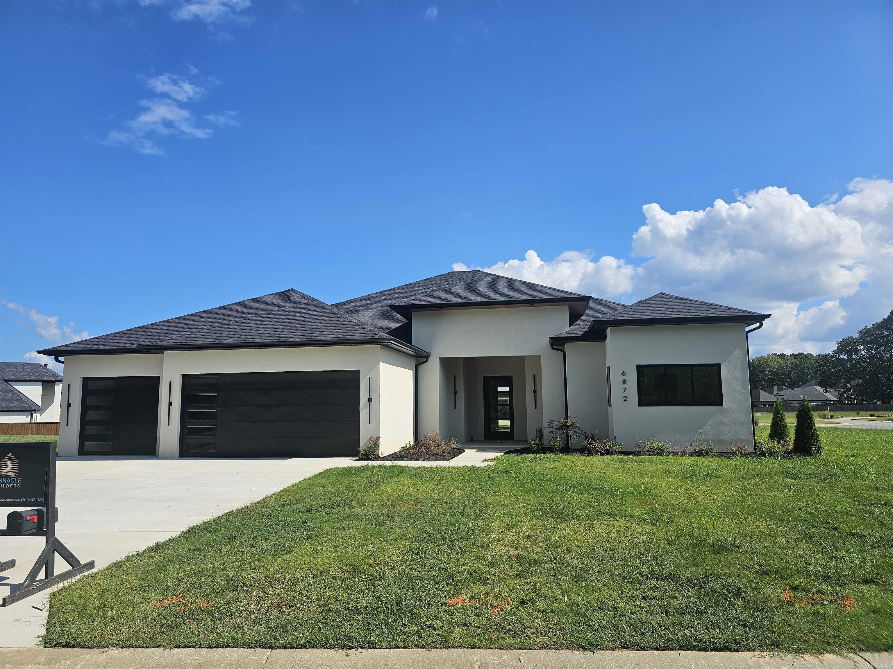 Step into the high-end, closed gated community of West Lake Village (Call Aaron for gate code). This 3060 sqft home sitting on a corner lot. On the outside this home features a full Stucco exterior, a 3-car garage, and a huge porch on the rear, pre-plumbed for an outdoor kitchen. On the inside, the living and kitchen area are open with tall 12' ceilings. The kitchen will have a double door refrigerator, granite counter-tops, and custom cabinets. The living room shines bright with the tall Anderson windows and multi-color electric fireplace. On the right of the home is the master suite with 10' ceilings, double doors that lead to the porch, a large walk-in tile shower, a free-standing tub, and 2 closets with built-ins. On the left of the home there are 3 bedrooms and 2 bathrooms, all with 10' ceilings. One of the bedrooms is an In-Law suite with its own full bathroom. This home also features foam encapsulated insulation to cap off its cozy atmosphere. Home is complete.