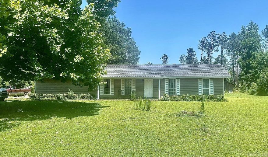 This country charmer sits nestled on 11 acres of privacy complete with a shop. Spacious living room and a large shop. Featuring 3 bedrooms and 2 bathrooms this makes a perfect property for easy living!