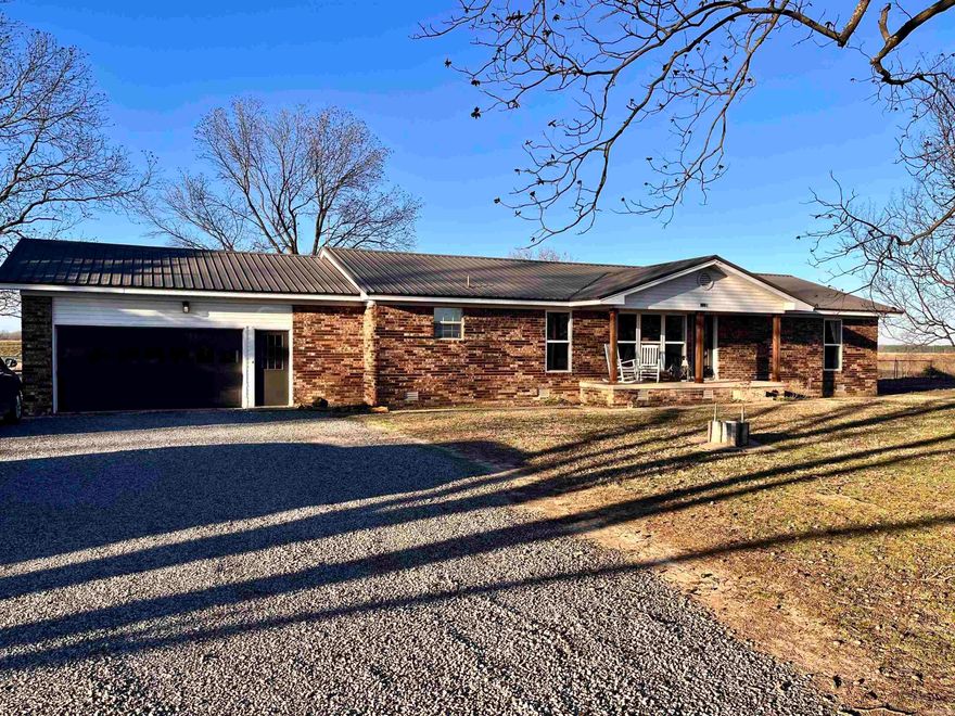 Hidden Gem in Griffithville  This home has SO much to offer! Brand new windows (less than 2 months old!) are a wonderful upgrade and fill the great room with beautiful natural light.  The spacious sunroom is perfect for a multipurpose space — home office, playroom, hobby room, or cozy second living area. This home is full of character and charm! Step outside and enjoy the beautiful yard with wide open spaces — ideal for gardening. The shop offers plenty of storage and workspace, and the animal barn is ready for your favorite animals… or even extra storage! Don’t let this one pass you by — it’s truly a hidden gem at $219K!