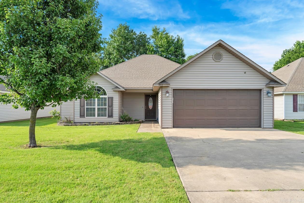 Just under 1,700 square feet, this beautifully maintained home offers the perfect blend of comfort and practicality. Inside, you'll find a spacious gallery-style kitchen, a warm and inviting living area with a stunning fireplace, and a generous master suite complete with a large bath and oversized walk-in closet. The two-car garage features built-in storage, and a secure safe room built into the floor, offering both convenience and peace of mind. Step outside to a large backyard with a screened-in patio that is great for relaxing or entertaining. Need extra storage? You'll love the additional storage building out back. Situated in a prime location, this home keeps you close to everything..shopping, great schools, dining, and entertainment are all just minutes away. Whether you're running errands or enjoying a night out, convenience is always at your doorstep. Combine that with the comfort and features this home offers, and you've got the perfect place to call home.