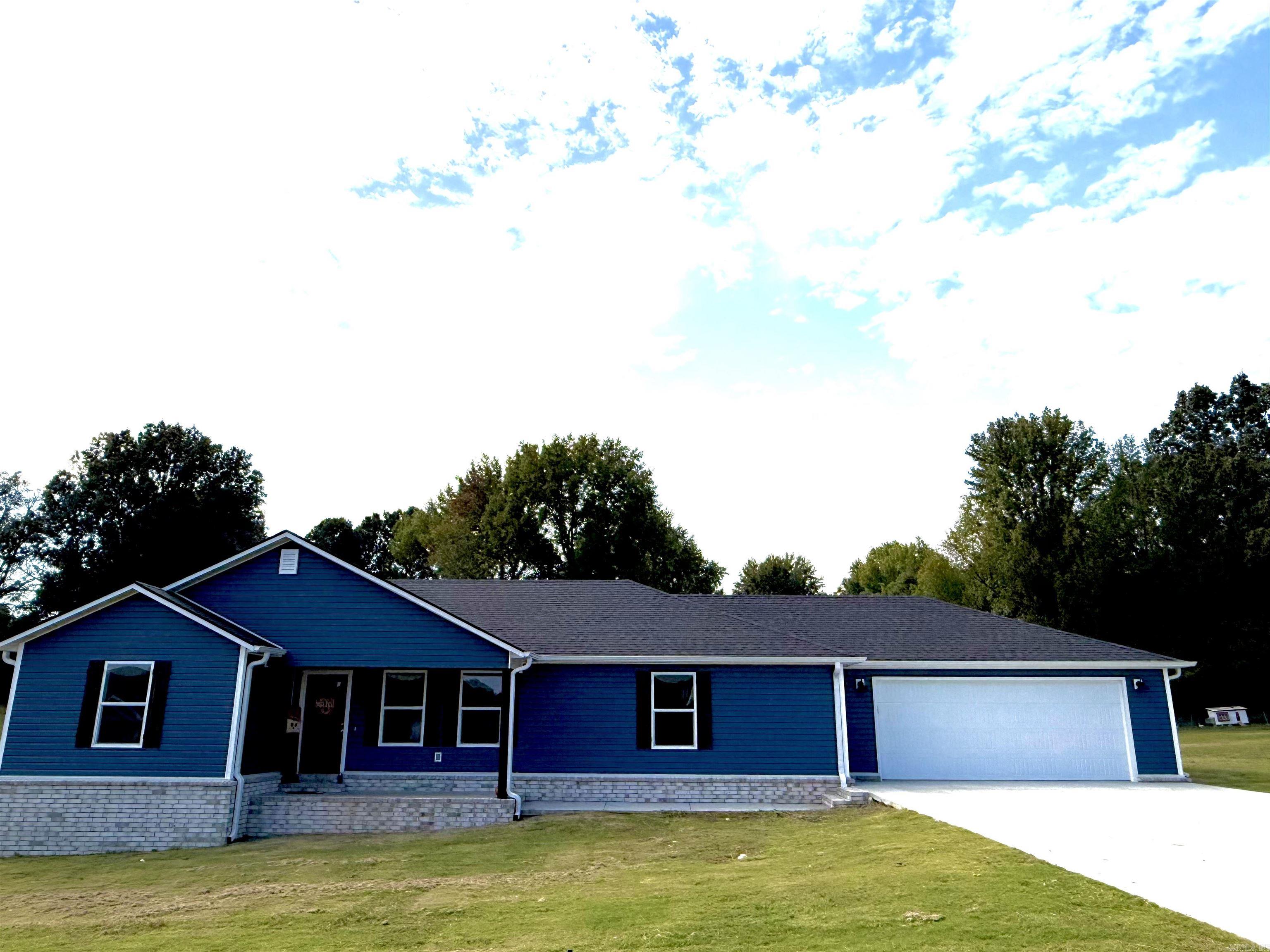 Welcome home to this beautiful brand-new 3-bedroom, 2 bath home perfectly situated on almost an acre in the desirable Oak Grove Heights area. This never-lived-in home features a wide-open floor plan with a spacious living and kitchen area that's perfect for entertaining. The kitchen offers a large island, double pantries, and plenty of storage for all your needs. Enjoy a separate laundry room, large extra bedrooms, and a comfortable main suite designed for relaxation. The exterior is just as inviting with newly stained shutters, a charming pop of color on the front door, and a double car garage providing ample space for vehicles or storage. Don't miss your chance to own this beautiful new home in a peaceful setting just minutes from town!
