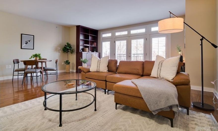 Live, Work, & Play! Condominium life waiting for you in this wonderfully located condo that offers: Maintenance free, gated parking, lock & go lifestyle that frees you up for walkablity to river trail, day to day conveniences, restaurants, entertainment venues and a quick hop in the car to easy access to I-30, I-40, I-630, LR National Airport and much more.  Spacious living area with a great french balcony open to kitchen, large bedroom  with walk in closet, washer/dryer combo (stays with condo) closet, storage closet/room located on second floor of an open air condominium building with access to an elevator, if needed.  Storage room is large enough to house your bike! Separate Laundry closet with washer & dryer included, HVAC closet houses water heater as well, and Refrigerator included  Ready for streamlined ownership without the lawnmower?  Condo fees include WATER, TRASH, EXTERIOR INSURANCE, EXTERIOR MAINTENANCE, SECURED ENTRY ACCESS, TWO NON ASSIGNED PARKING SPACES,TERMITE POLICY, a complete list is available upon request.  When considering your POA dues, consider your expenses that are covered.