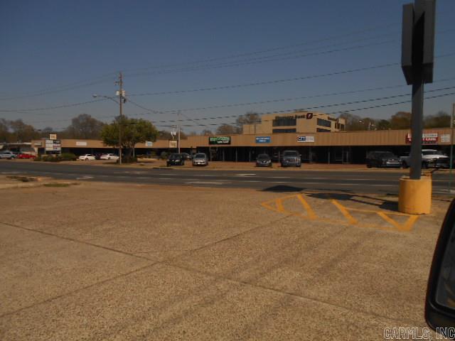 "A RARE FIND" One of El Dorado's most well-known Shopping Centers. Over 17,000 square feet of commercial buildings sitting on 1.27 acre. Features 10-12 business entities and free parking included. Popular Northwest Avenue and West Grove Intersection. Approximately 349 feet frontage on Northwest Avenue.