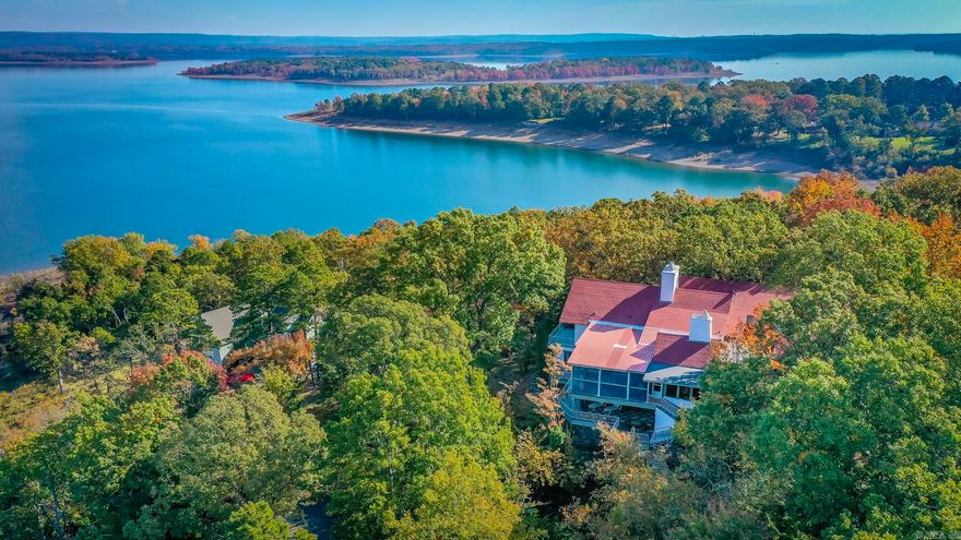 You will love this charming home in Eden Isle just minutes from Red Apple Inn and Greers Ferry Lake!! Built by the original developer of Eden Isle, this unique property has beautiful scenic views from every angle. The floor plan encompasses 4 roomy bedrooms, 4 bathrooms giving you over 7,000sf of spacious elegance! The generously proportioned interior flows effortlessly from the open-plan living space to the multiple private patios perfect for family gatherings! NEW HVACS and home comes fully furnished. All of this situated in a convenient, friendly neighborhood. Call today to see this lovely property!