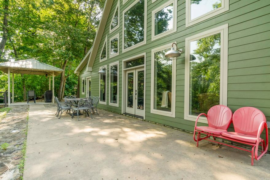 Experience the perfect blend of comfortnand privacy in this stunning home nestled along the tranquil banks of the Little Red River.  Featuring beautiful polished concrete floors and an open-concept layout, this fully furnished property is designed for both relaxation and entertaining.  Enjoy cozy evenings by the gas fireplace.  Trout fishing enthusiats will love the large dock with easy river access.  Weather you're looking for a full-time residence or vacation property, this secluded gem has it all.