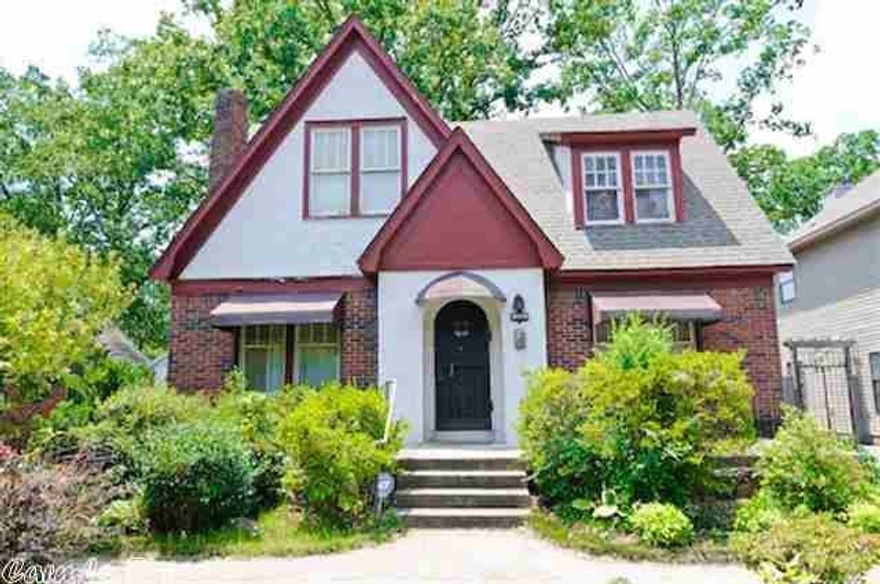 Wonderful charm located in the heart of Little Rock, close to UALR.  Master and full bath down, 3 bedrooms and bath up. Spacious kitchen, dining room w french doors, beautiful wood floors. Back yard has covered patio, fire pit, tree house, storage building.  Guest house w full bath (not included in sq ft) ***agents see remarks***