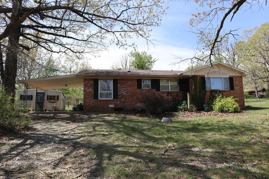 COUNTRY HOME & ACREAGE FOR SALE GLENCOE ARKANSAS. Property is located at 6347 Hwy 62/412 E, Glencoe, AR. 2 bedroom, 1 bath brick home with approx. 1,214 sq ft of living area. The home is being sold "AS IS". The home will need repairs. The house sits on 3.76 acres M/L. Property has recent survey. Great location. Lake Norfork, Spring River, and the world famous White River are within 30-45 minutes of the property.