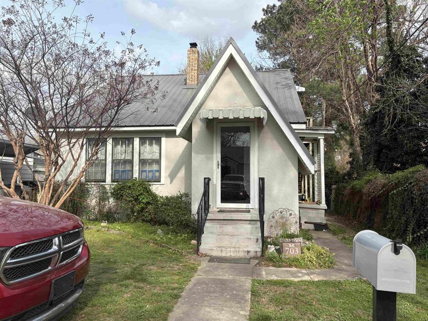 Sold before listed. 3 bedroom, 2 bath cute home behind hospital. Newer metal roof, fenced in back yard & storage building.