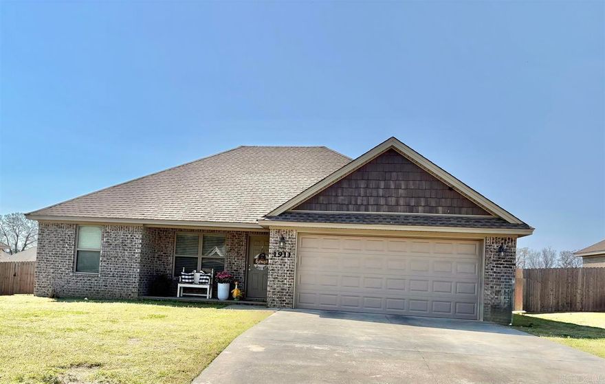This spotless home at 1911 Rehoboth looks and feels brand new. The inside is perfectly clean and features a nice open kitchen and living room with a pantry and pretty flooring. It has a split floor plan for extra privacy, including a primary bedroom with a big walk-in closet and a guest bath with a walk-in shower. There is plenty of storage throughout, including a two-car garage and some floored space in the attic. Outside, you will find a large, privacy-fenced backyard with a nice patio and gates on both sides of the house. With blinds already installed and everything in great shape, this home is completely move-in ready. Agents see remarks