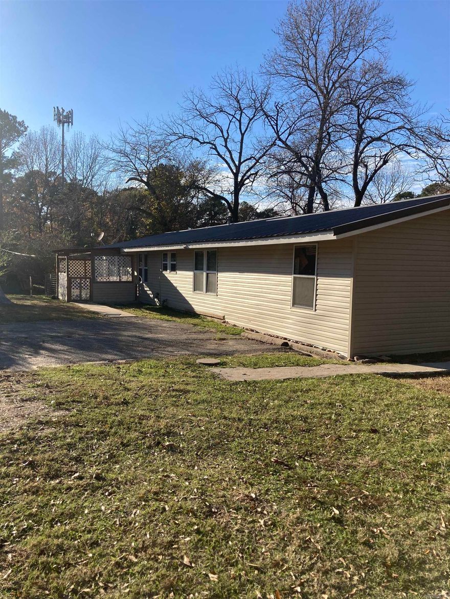 This is such a cute home that is ready for your family! This would also make a great weekend or vacation home since it's located just 1/2 mile to Lake Greeson and Bear Creek Cycle Trail. The 3 bedroom, 2 bath, and large storage area will give you plenty of room for everyone and recreational toys!