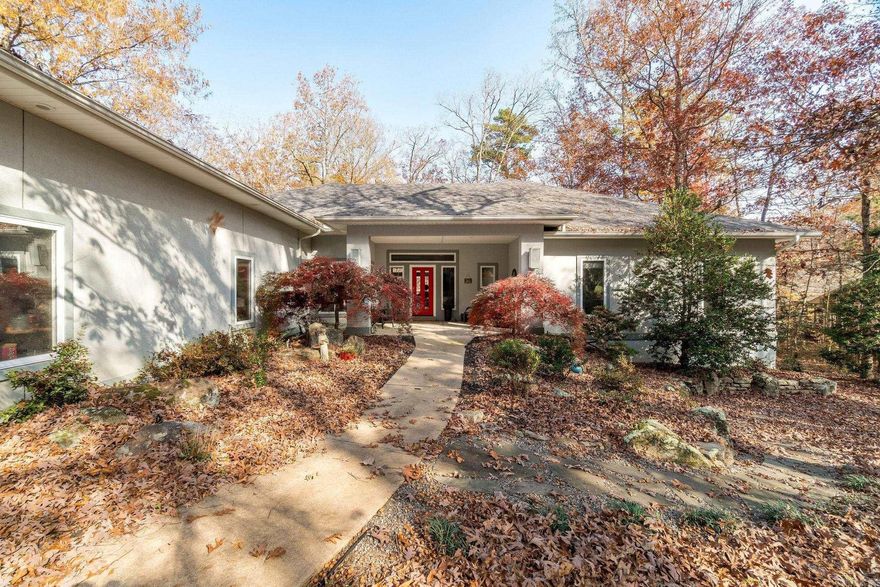 10' & 9' ceilings - sunroom vaulted with trapezoid windows (12X24). hardwood, carpet & tile. Large utility w/ adjacent office space. Corian counters. Sewing/ craft room, huge storage closet, pantry. Oversize 2 Car Garage (30'X24' deep), Garden bay window above sink. Main bathroom has his/her walk-in closets & his/her lavatory areas. No popcorn ceilings. Nice, Large courtyard in front. Wood burning Fireplace w/ gas logs. Durock exterior. Sets on #2 Green of Cortez Golf Course.  SEE AGENT REMARKS