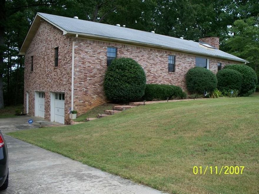 This 3/4 bedroom home will surprise you when you get inside. All rooms are large and has 10' ceilings, large family, kitchen that will accommodate large families. The 900' in basement is not counted in the square feet. It has a large bedroom and game room and perfect for that storm cellar when the weather is bad. Fireplace can be converted to heat entire house. Decking on roof is 3/4" plywood.